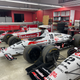 Three of driver Michael Andretti's Newman/Haas IndyCars, two sporting the Kmart Liveries